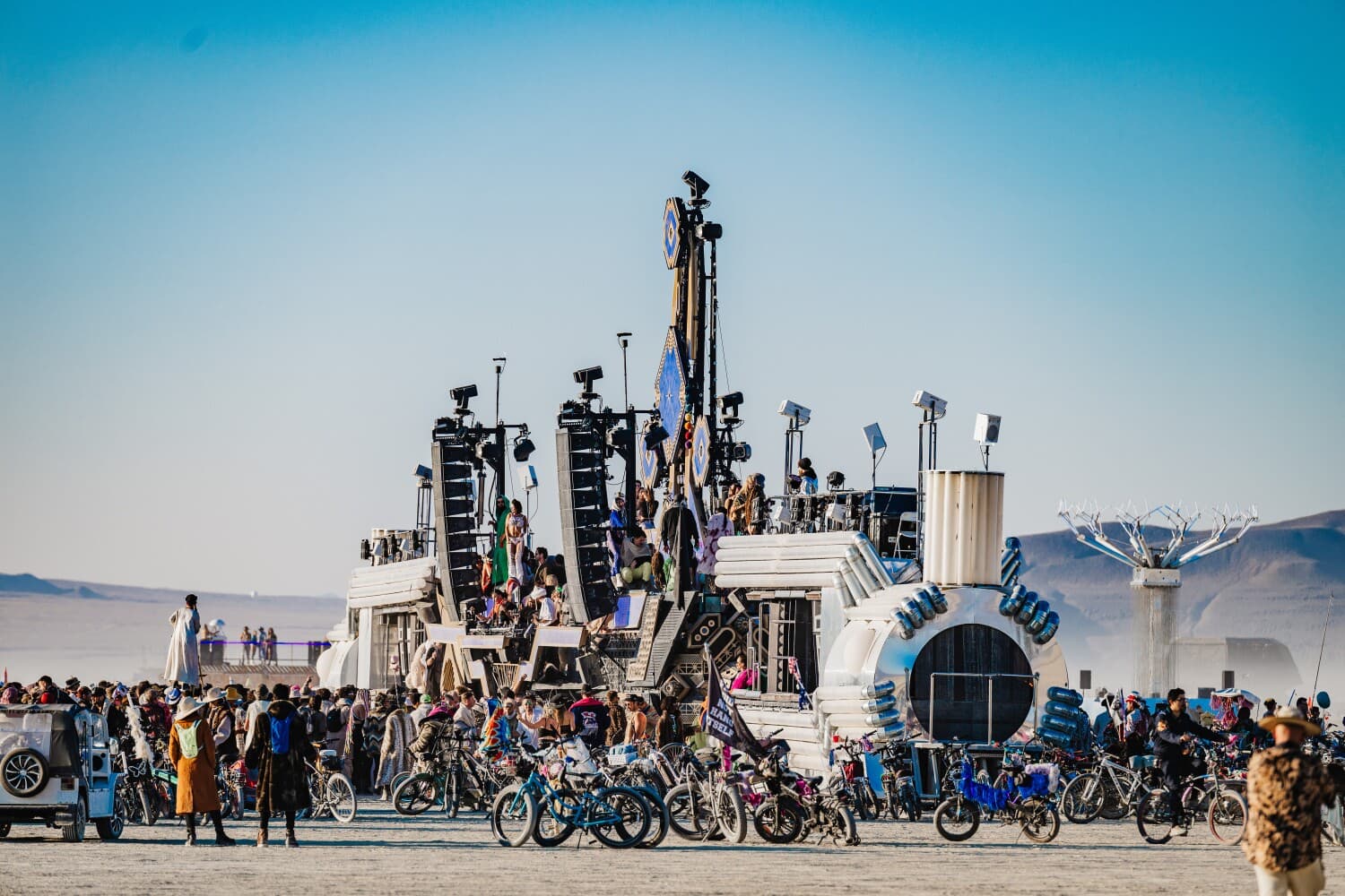 BiPolar Express and Mayan Warrior during a daytime Playa linkup, with Singularity Tree nearby