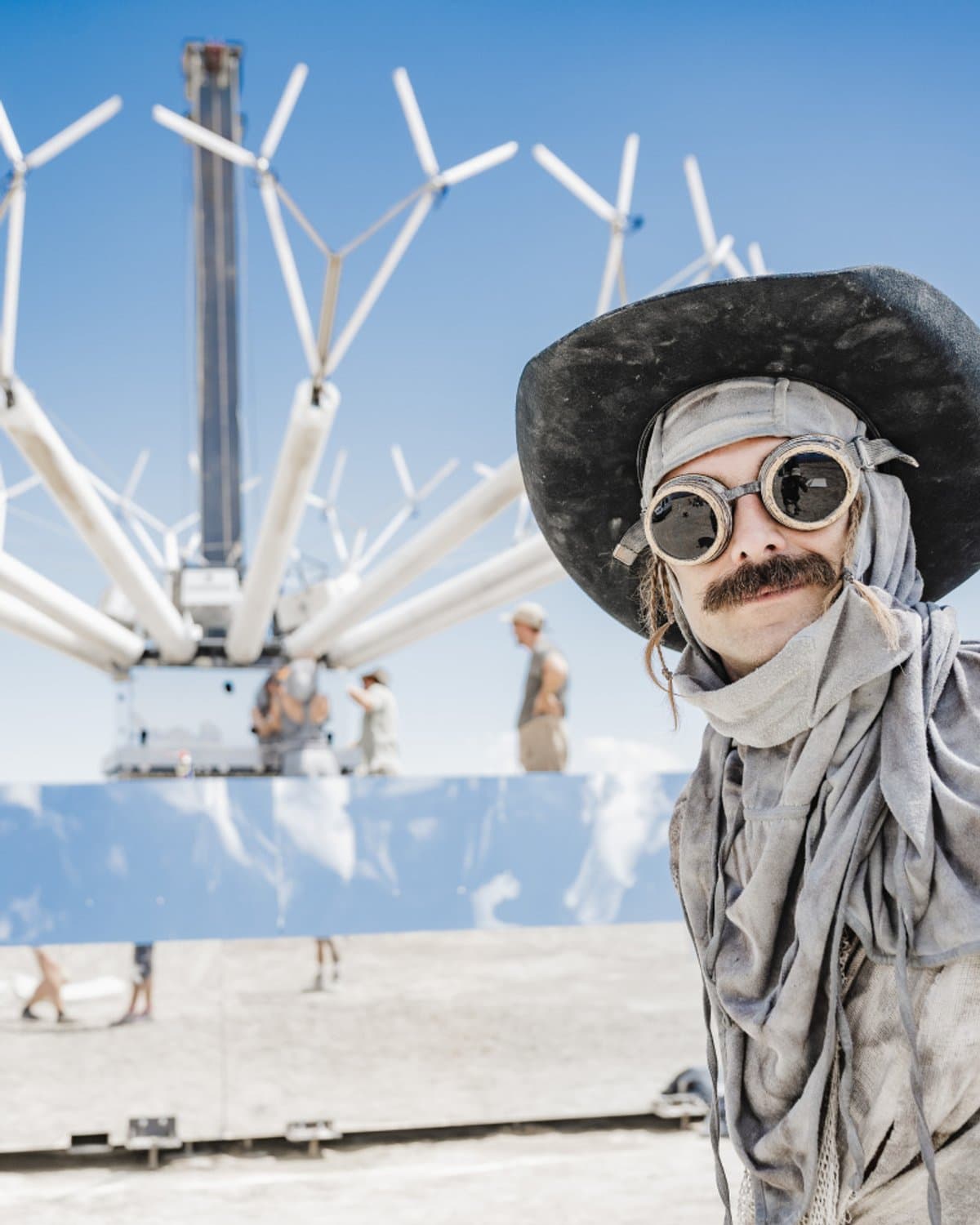 Oleksandr Andriienko on the Black Rock playa, Singularity Tree behind him.